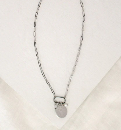Short Necklace | Round Starburst Pendant. Silver