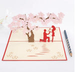 Couple under Cherry Tree Pop Up Greeting Card