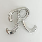 Brooch "R"